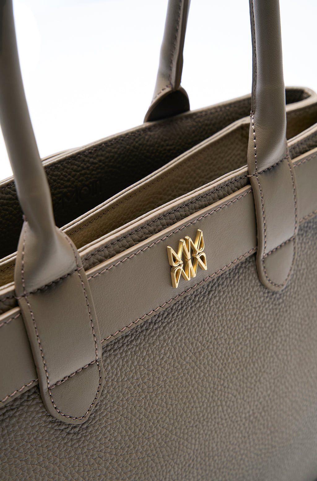 Tote bag in leather with belt detail