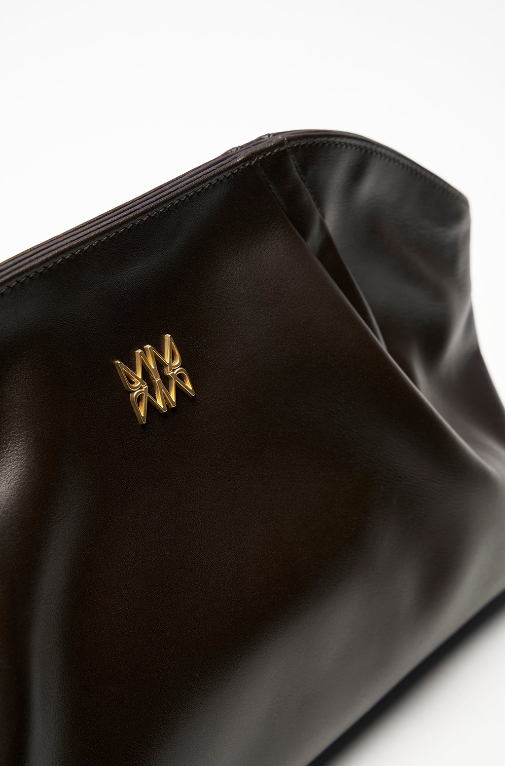 Leather Slouchy Clutch With Metallic Monogram