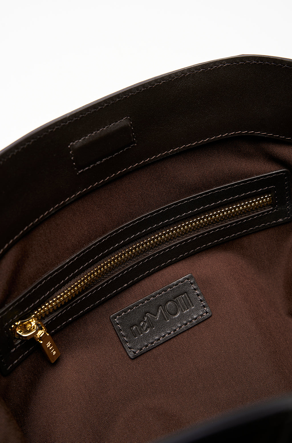 Leather Slouchy Clutch With Metallic Monogram