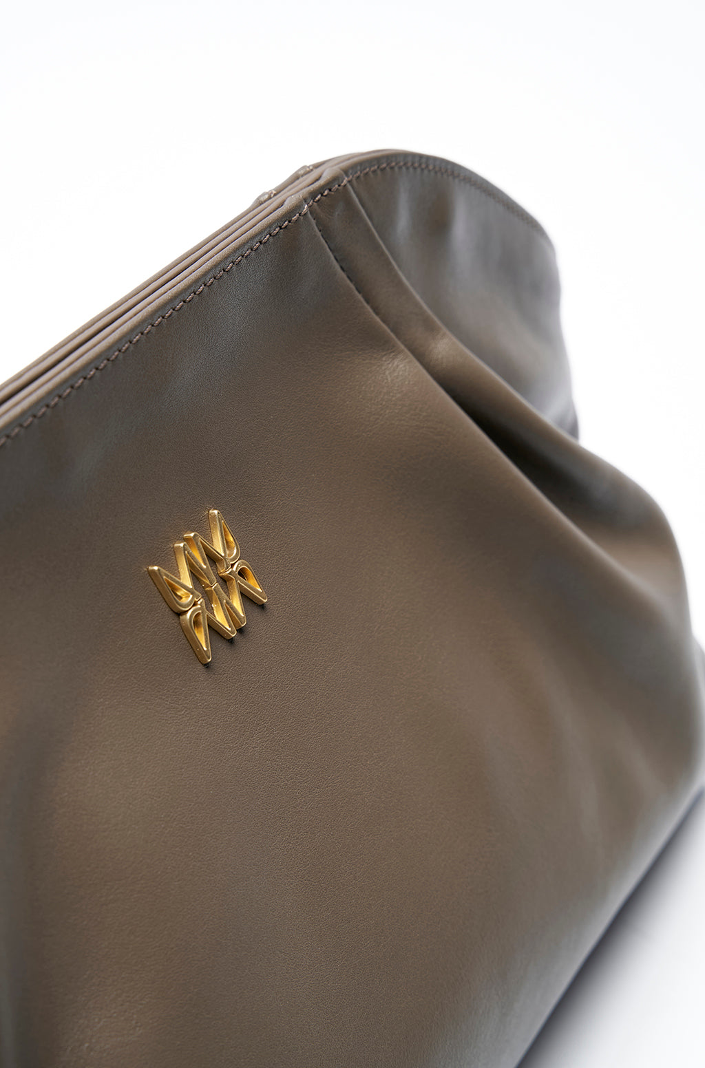 Leather Slouchy Clutch With Metallic Monogram