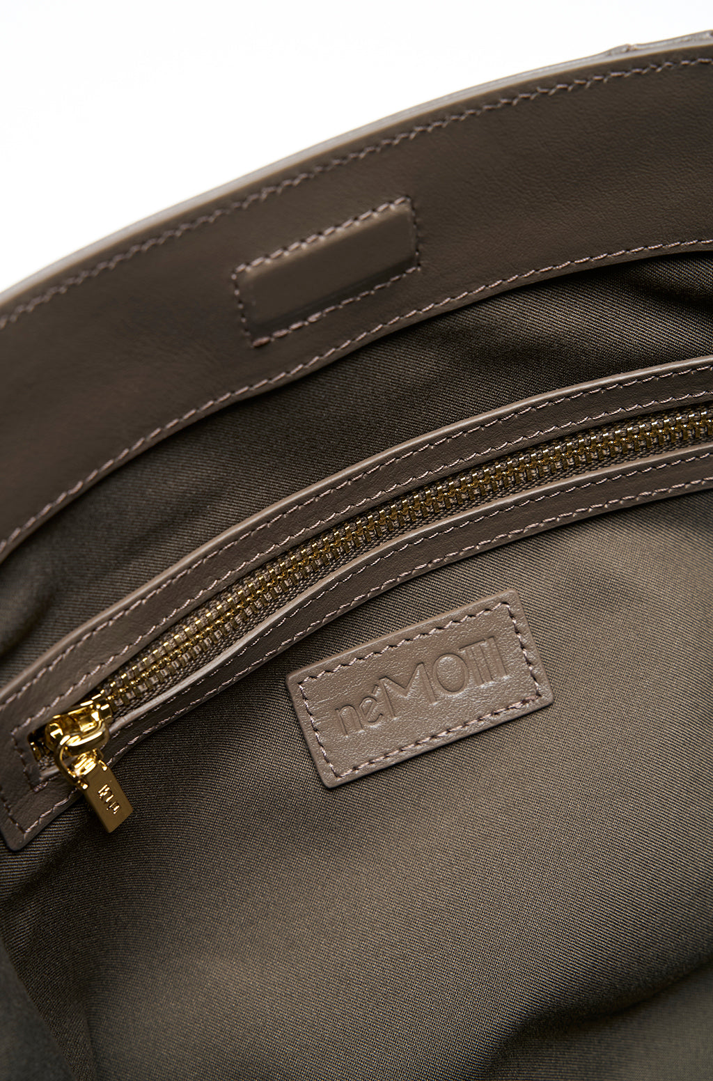 Leather Slouchy Clutch With Metallic Monogram