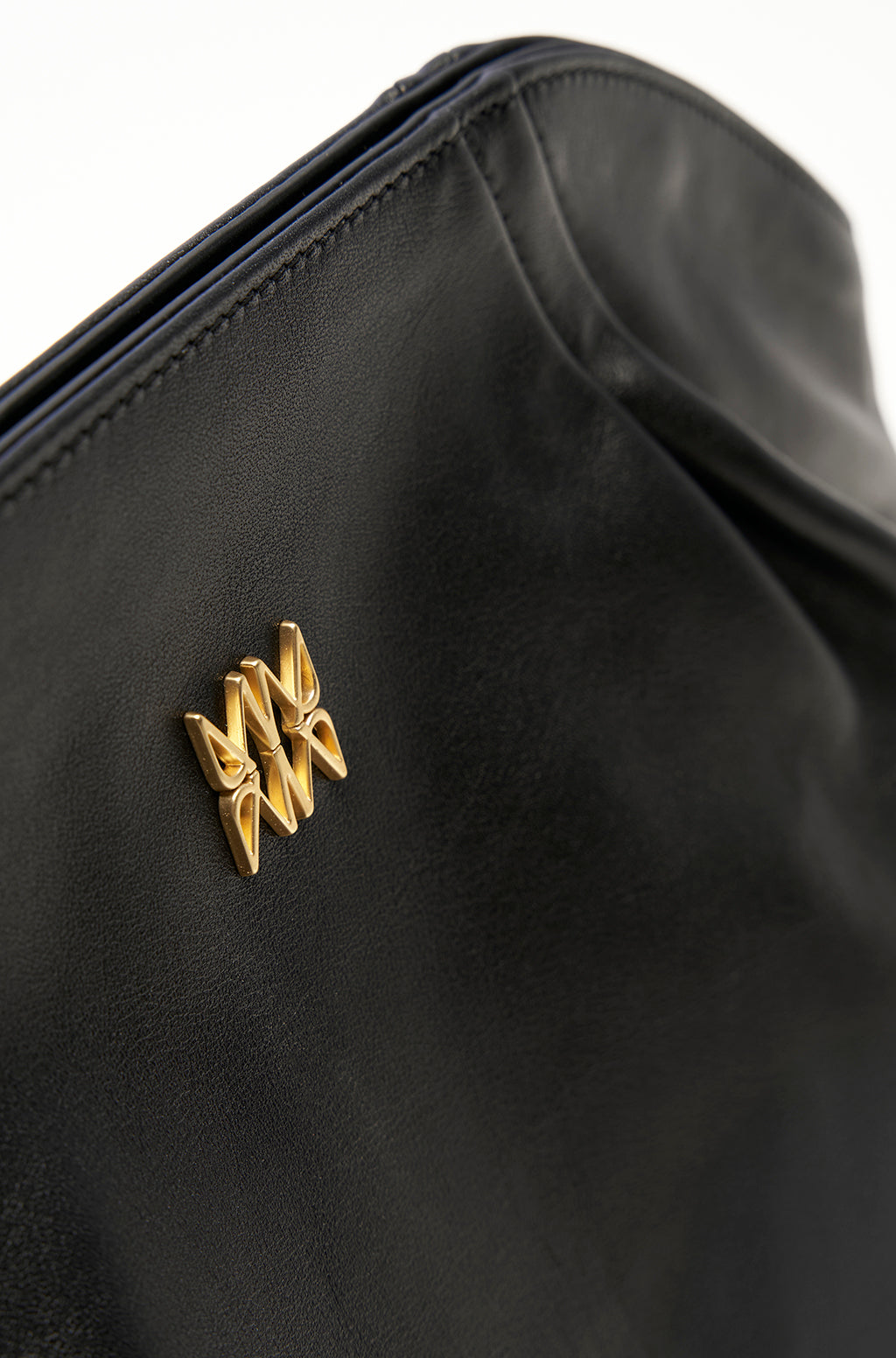 Leather Slouchy Clutch With Metallic Monogram