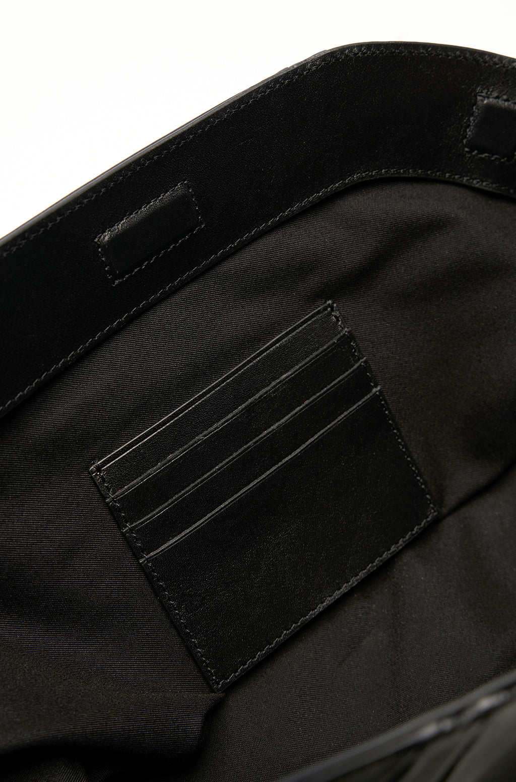 Leather Slouchy Clutch With Metallic Monogram