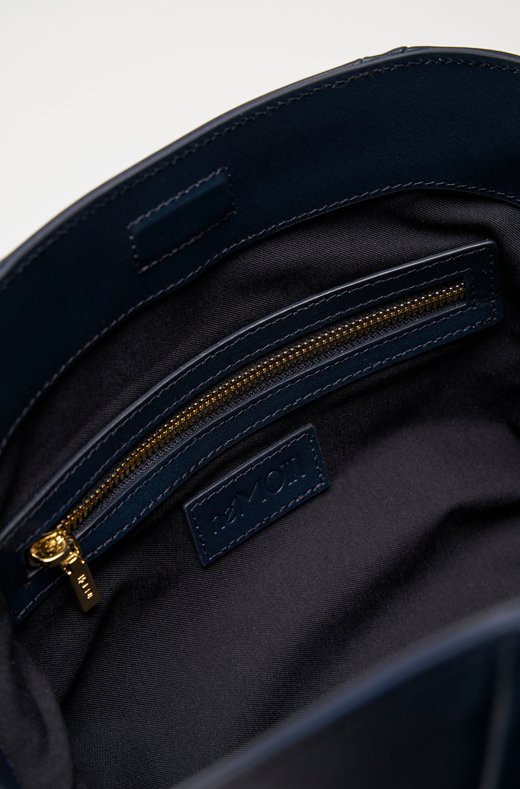 Leather Slouchy Clutch With Metallic Monogram